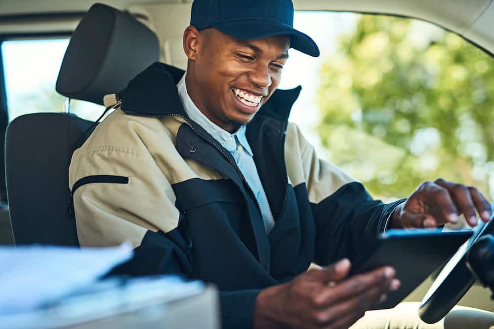 Driver using tablet for field and fleet operations
