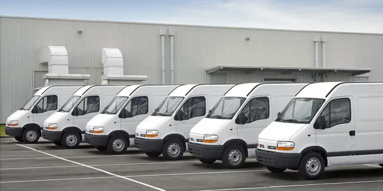 Service fleet vans parked in a lot