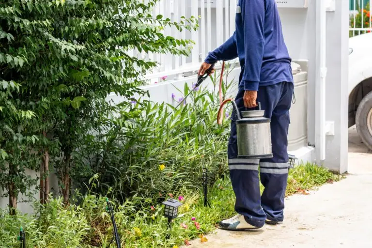 Pest control technician using ServiceBridge mobile app for route management and customer service